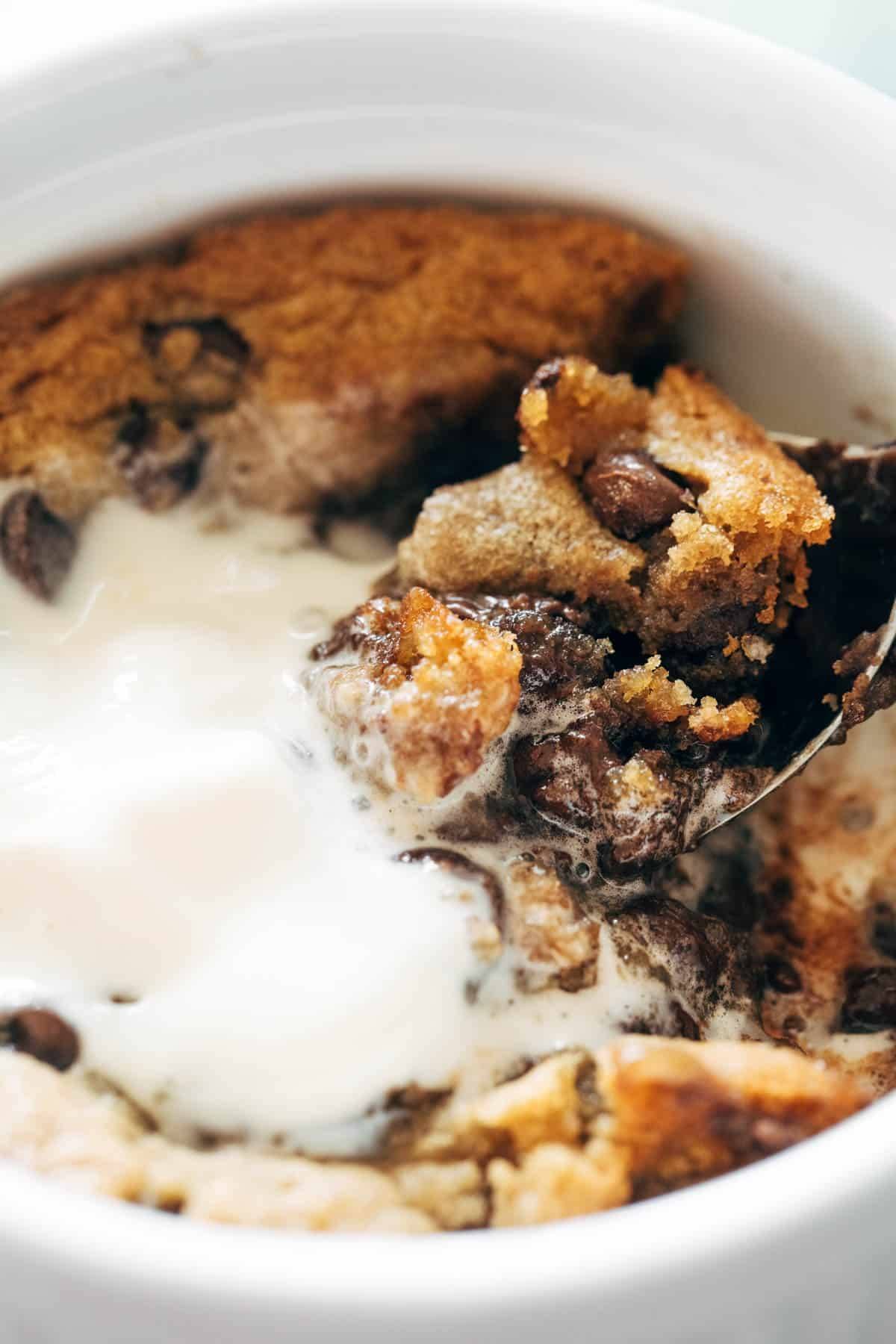 Deep dish cookie bowl scooping up ice cream.