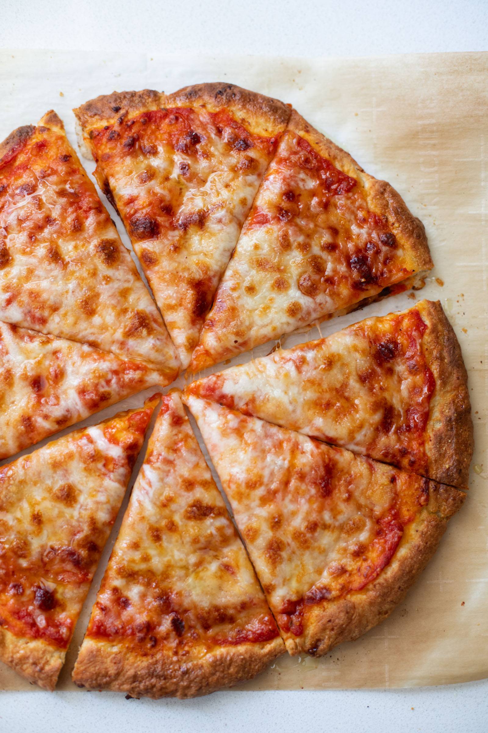 Pizza with a cottage cheese crust, cut into slices