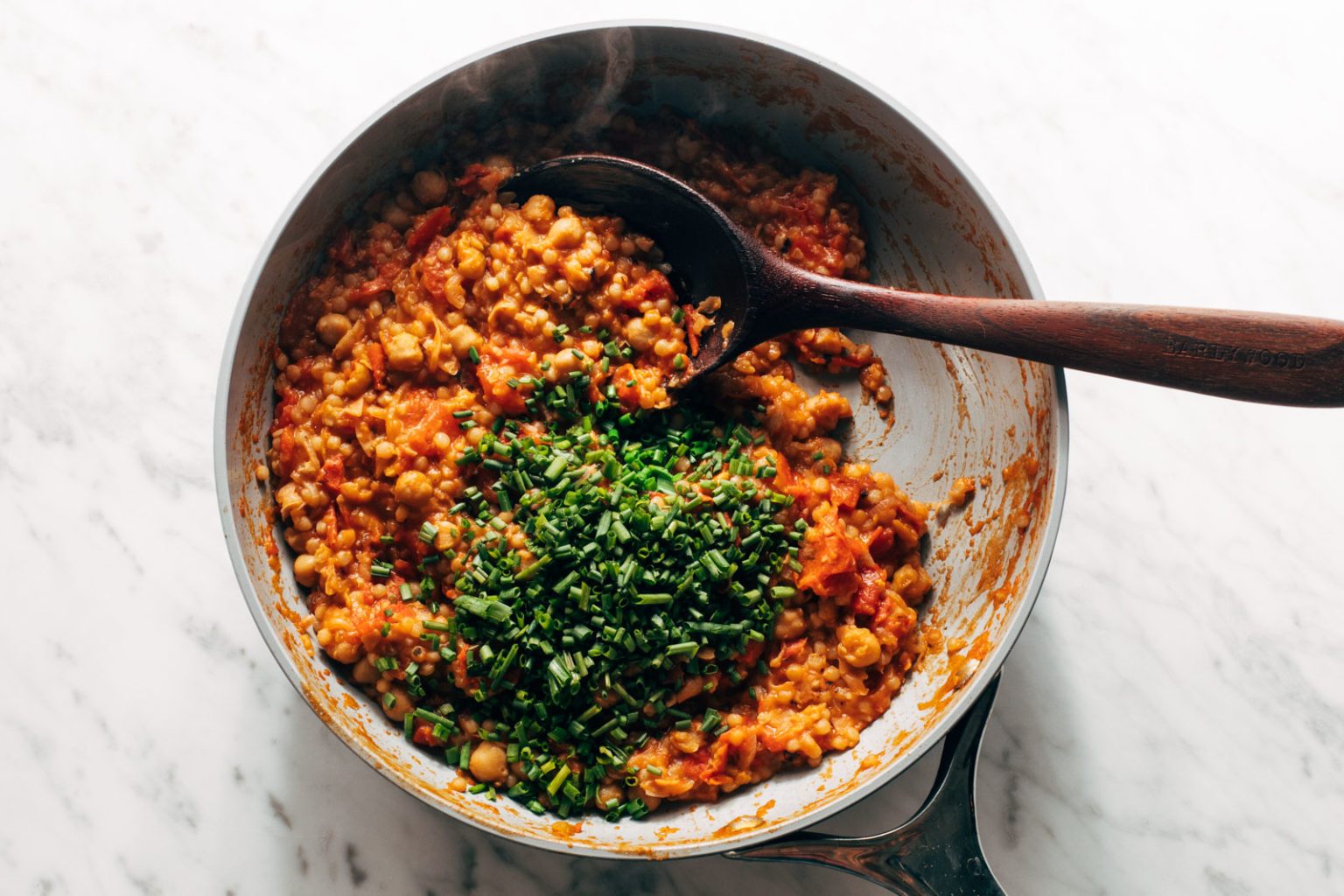 Pearl Couscous Skillet with Tomatoes, Chickpeas, and Feta Recipe