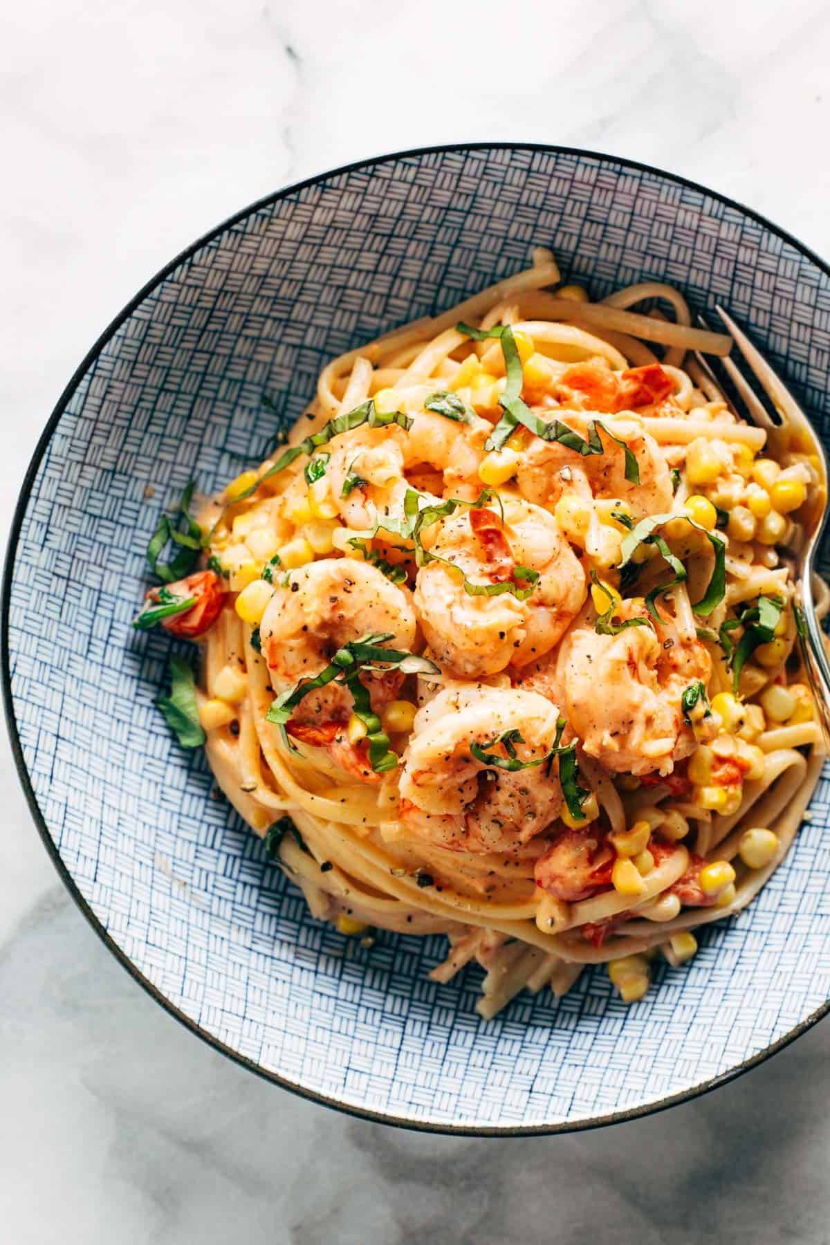 Creamy shrimp pasta in a bowl.