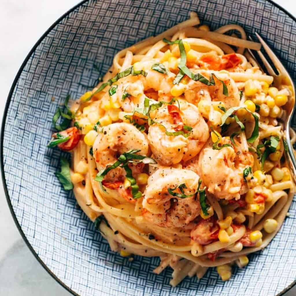 Creamy shrimp pasta in a bowl.