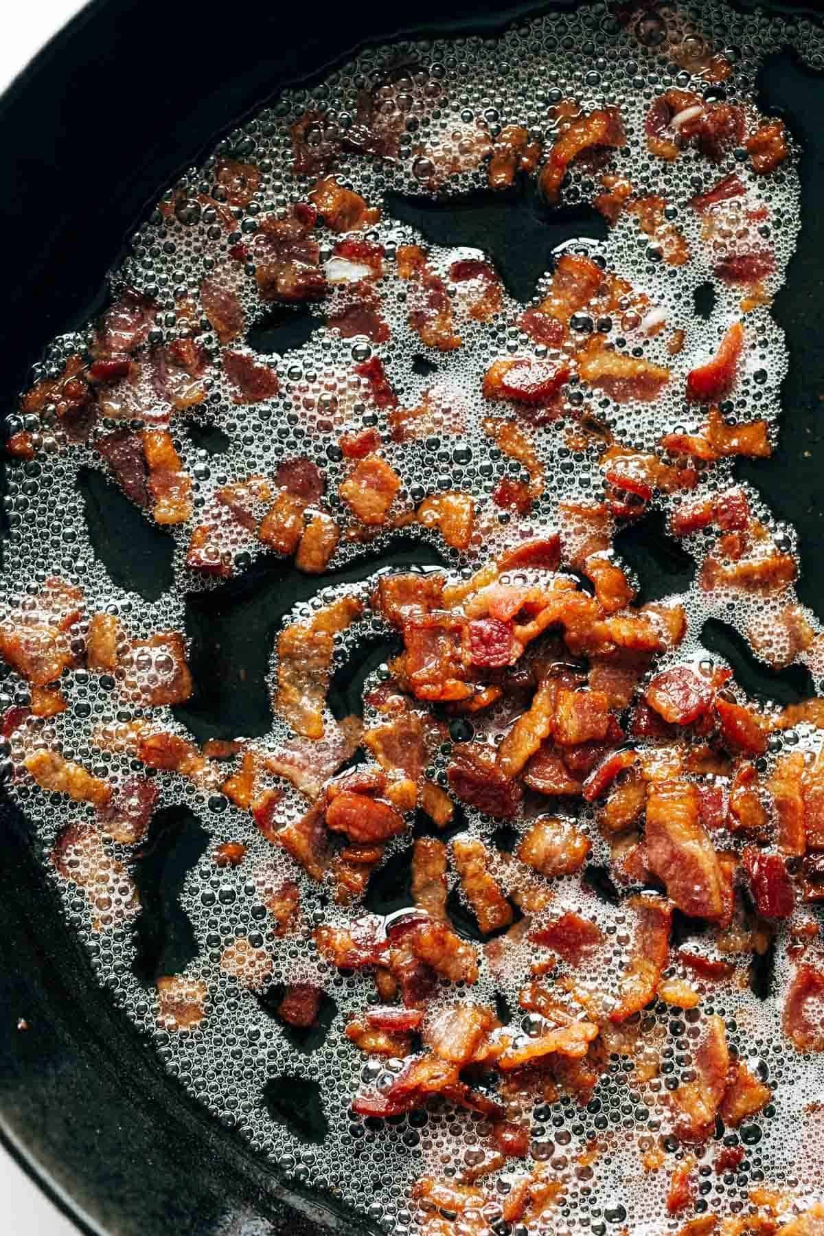 Crispy bacon in a pan. 