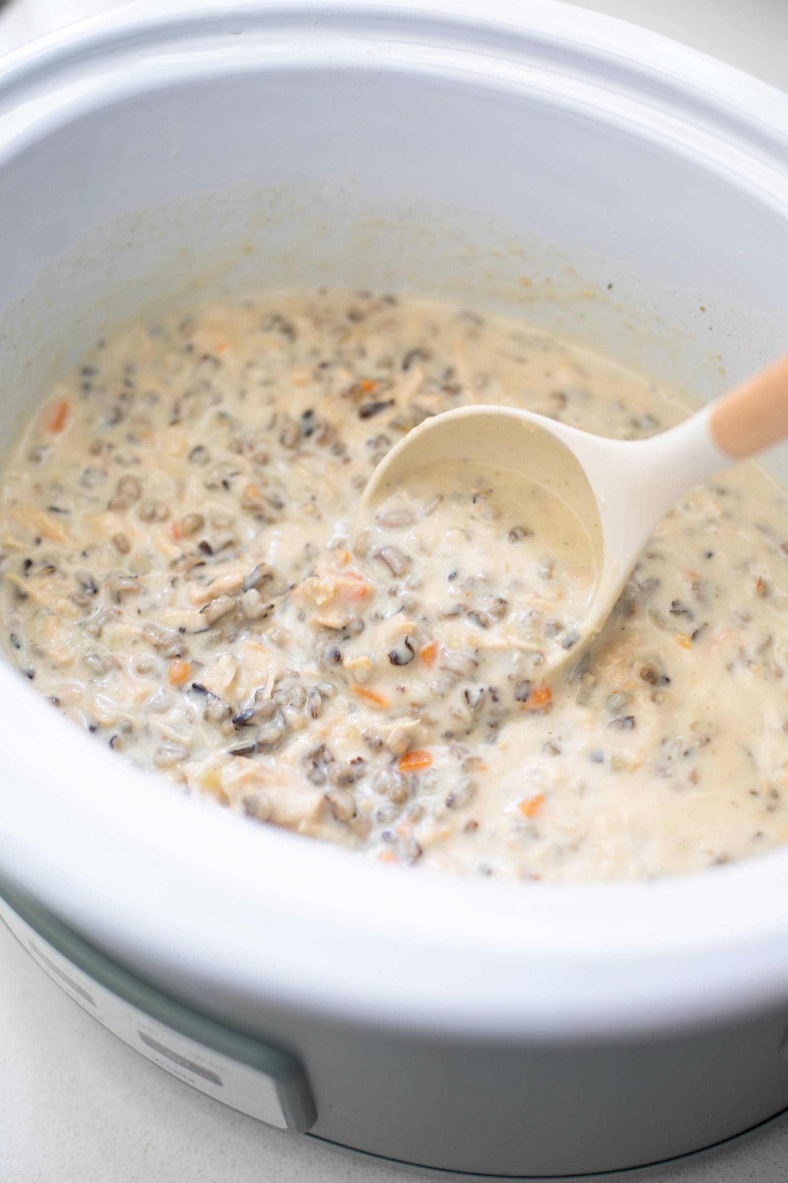 Creamy wild rice soup in a crockpot.