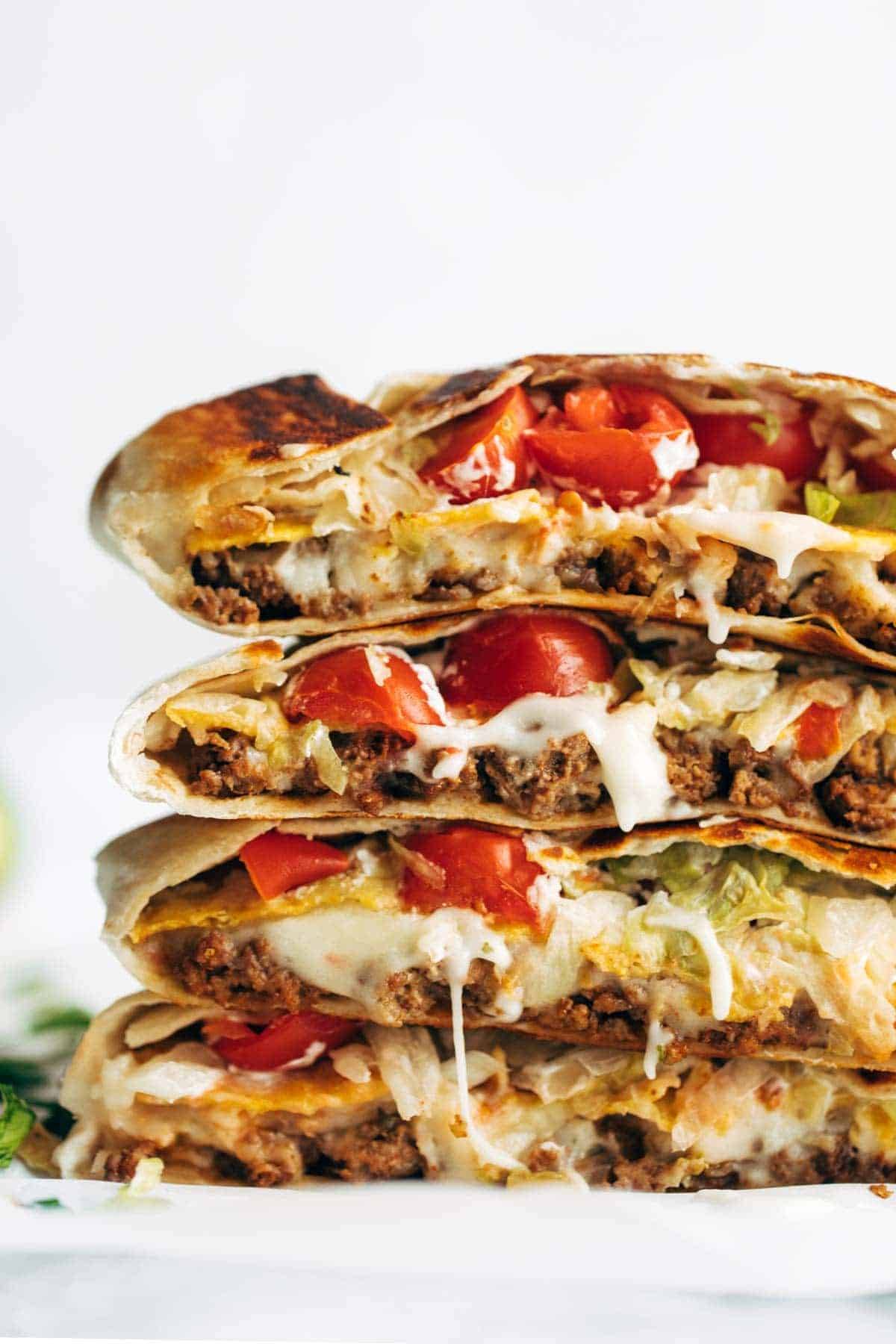 Crunchwrap Supremes in a stack.