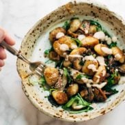 Mushroom Gnocchi in a bowl with sauce.