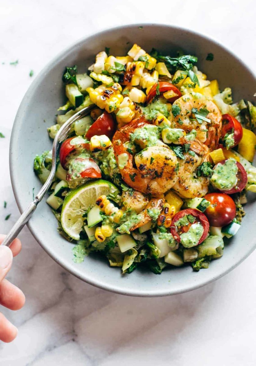 Glowing Grilled Summer Detox Salad in a bowl with a fork.