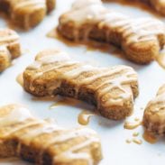 Dog Treats on baking sheet with drizzle.