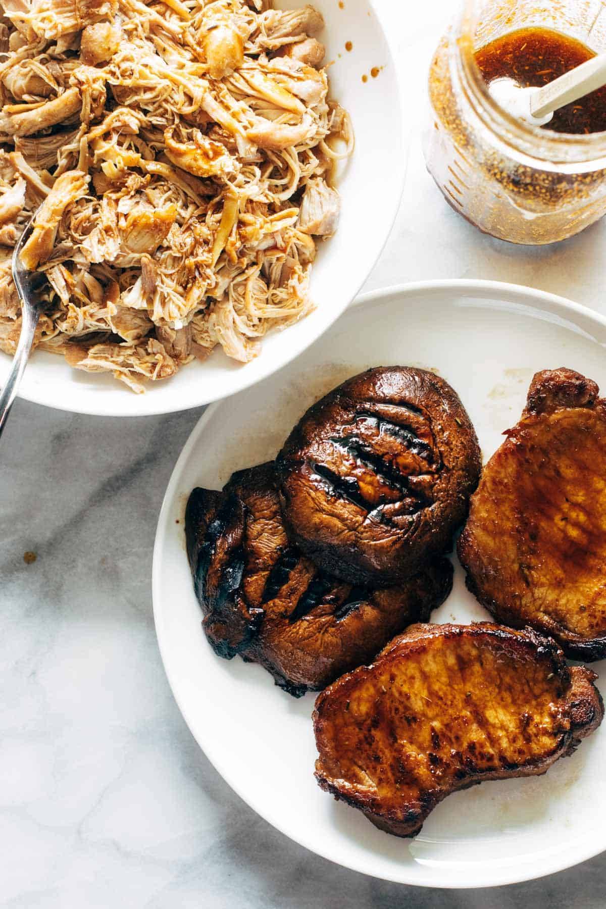 Marinated chicken, mushroom caps, and pork chops.
