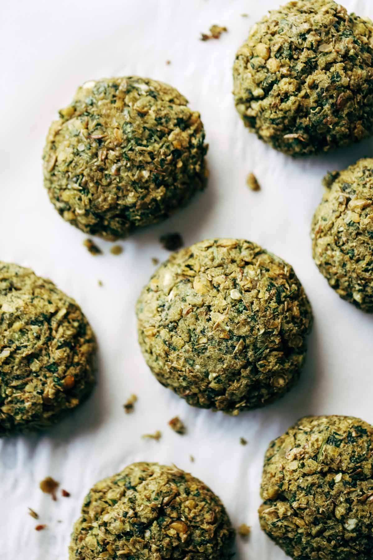 Easy baked falafel at home in 30 minutes WITHOUT deep frying! Features lentils, herbs, garlic, lemon juice. Use in salads, sandwiches, healthy recipes. | pinchofyum.com