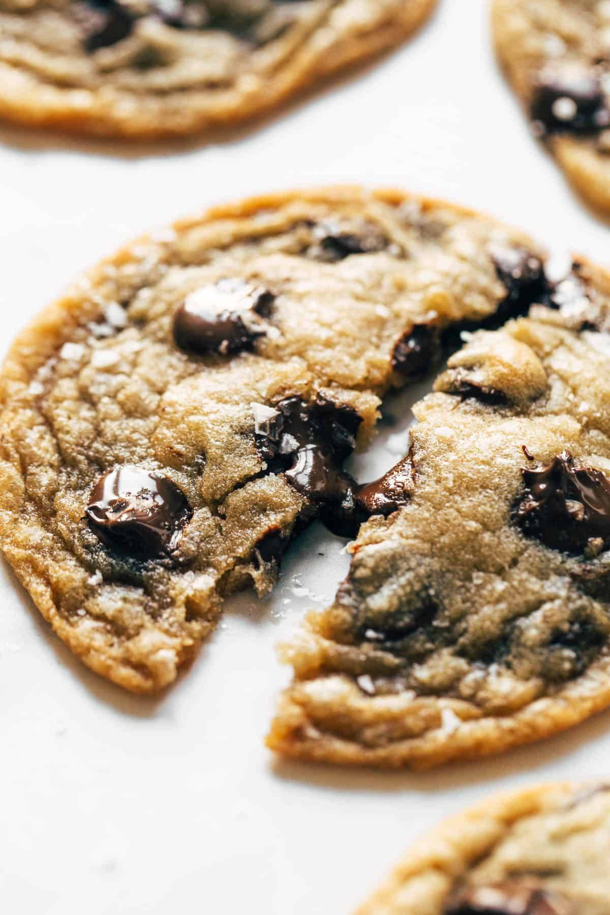 Close up image of a cookie with melted chocolate chips