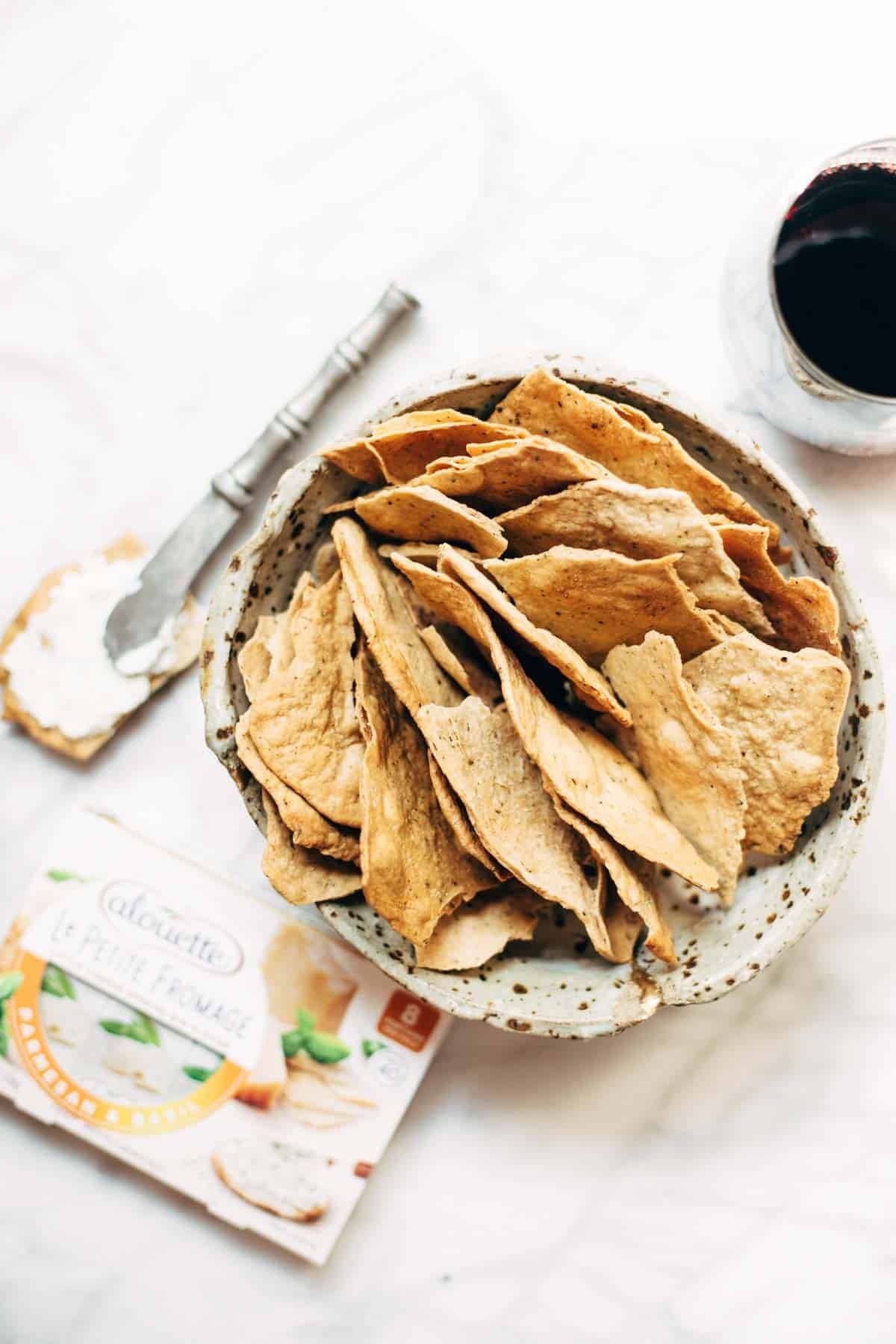 These easy homemade flatbread crackers are super adaptable and they are the perfect pair for cheese and wine. Crispy, real food, snacking perfection! | pinchofyum.com