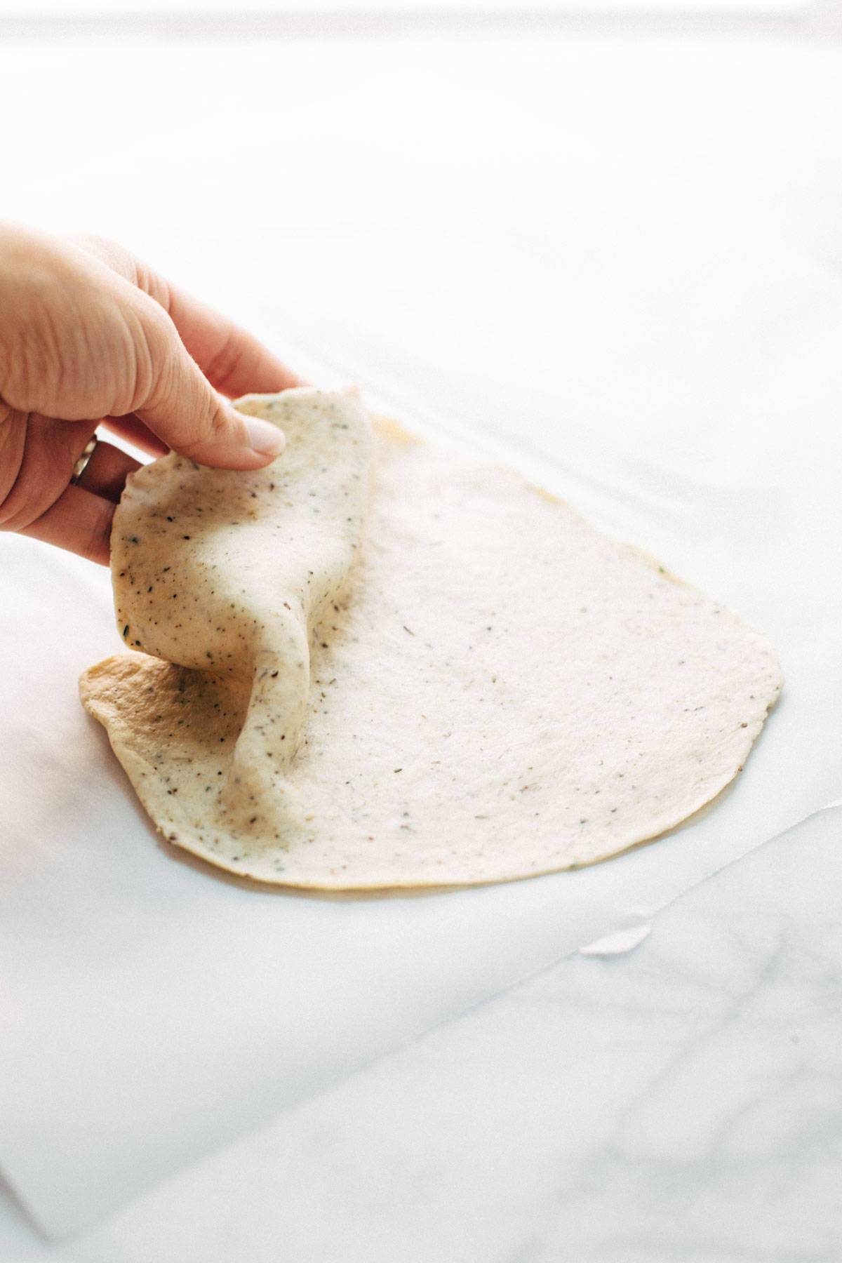 These easy homemade flatbread crackers are super adaptable and they are the perfect pair for cheese and wine. Crispy, real food, snacking perfection! | pinchofyum.com