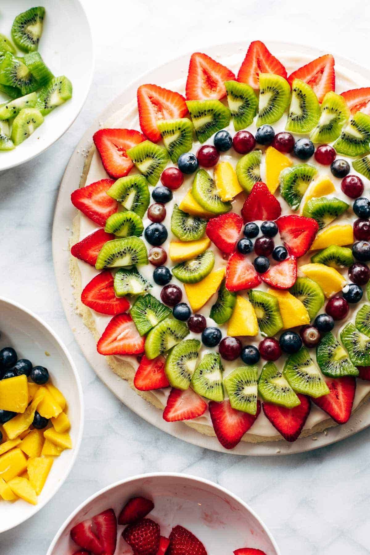 Fruit pizza on plate.