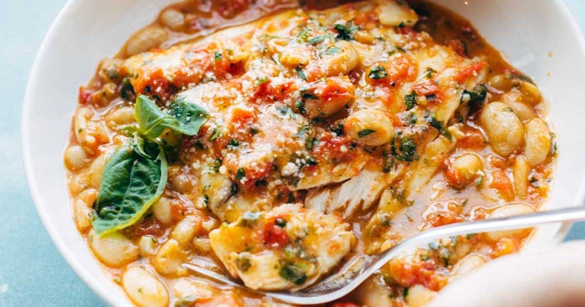 https://pinchofyum.com/wp-content/uploads/Garlic-Basil-White-Fish-Skillet-with-Tomato-Butter-Sauce-4-Yoast.jpg