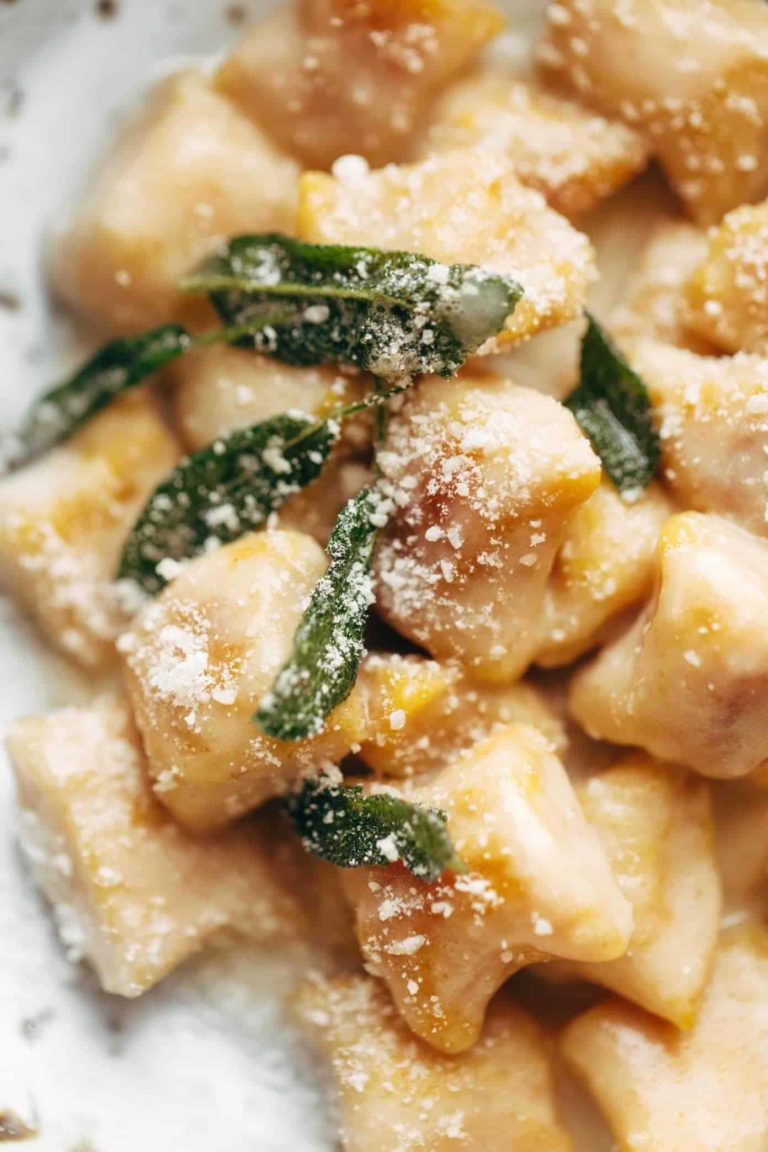 Pumpkin Gnocchi with Sage Butter Sauce on a plate.