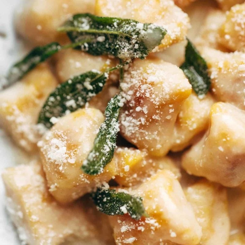 Pumpkin Gnocchi with Sage Butter Sauce on a plate.