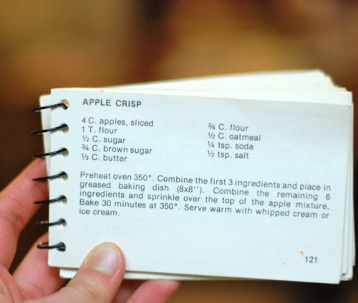 Apple crisp recipe on a recipe card.