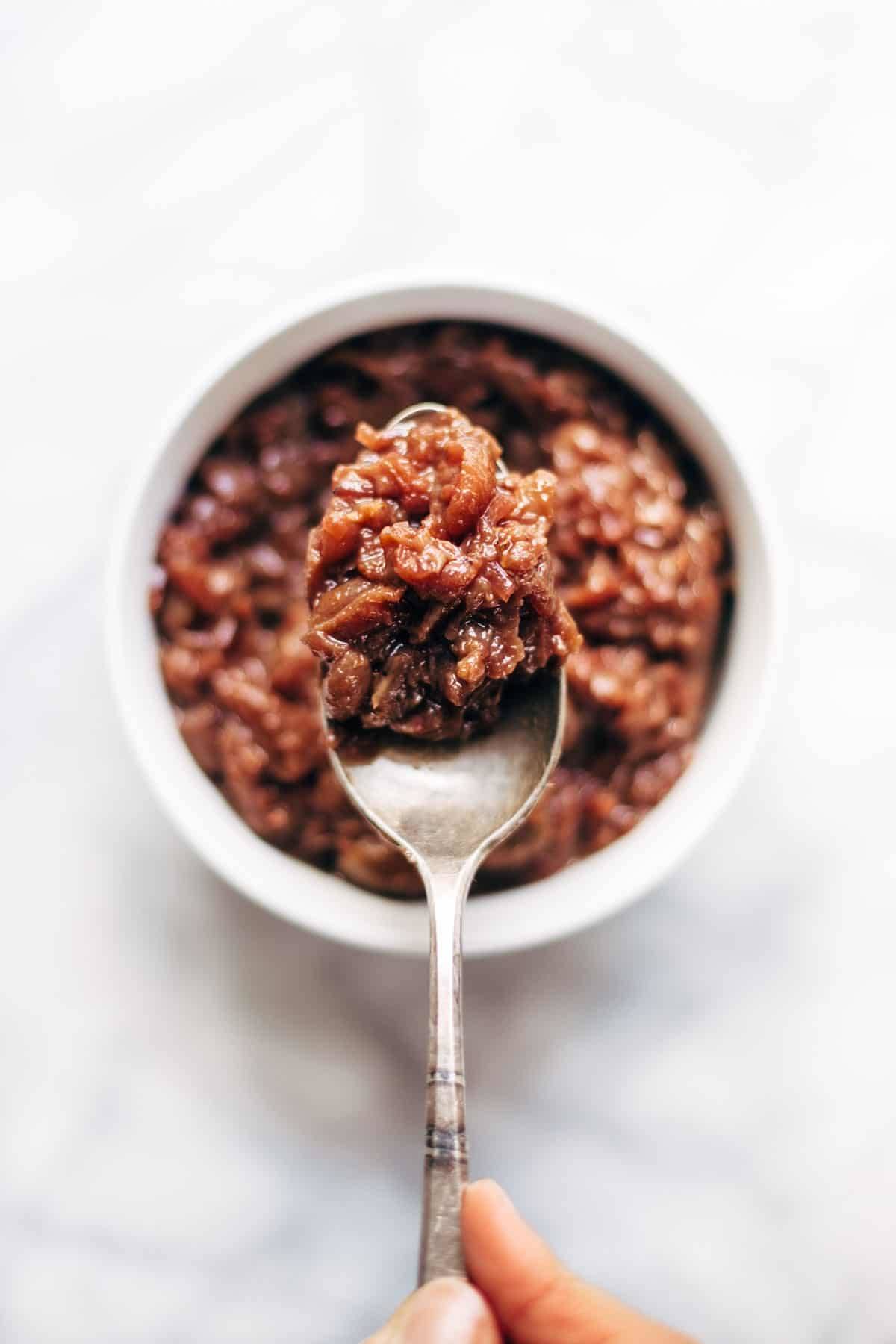 Caramelized Shallot and Grape Chutney! Made with shallots, grapes, red wine, cinnamon, bourbon, and vinegar. So good with plate of crispy crackers! | pinchofyum.com
