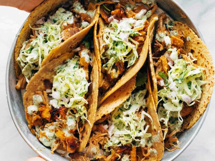 Chicken tacos on a plate.