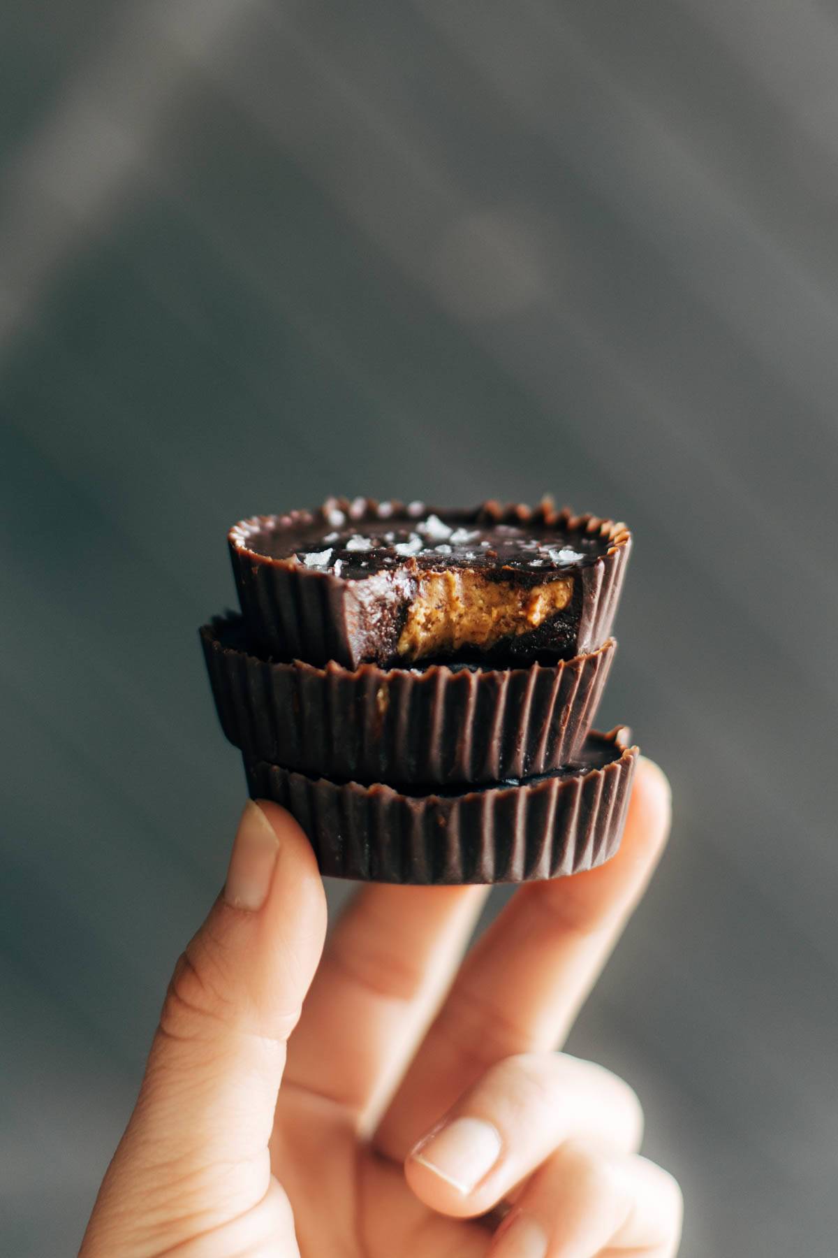 Almond butter cups with bite taken out.