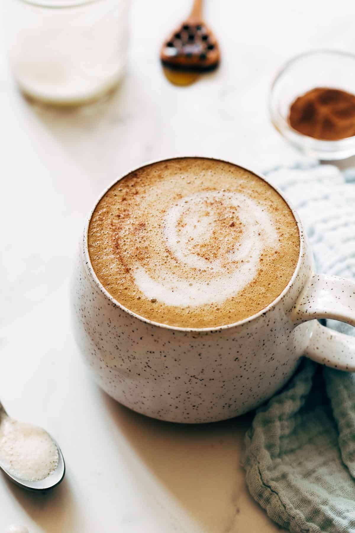 Oatmilk honey latte in a mug.