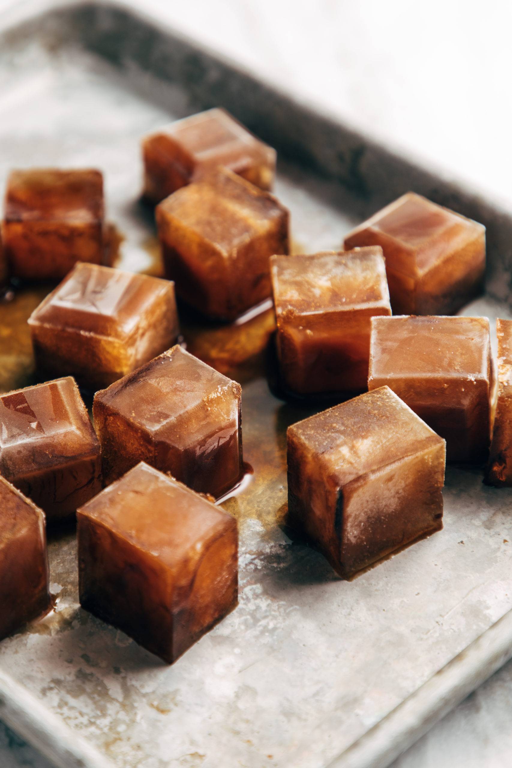 Coffee ice cubes on a sheet pan