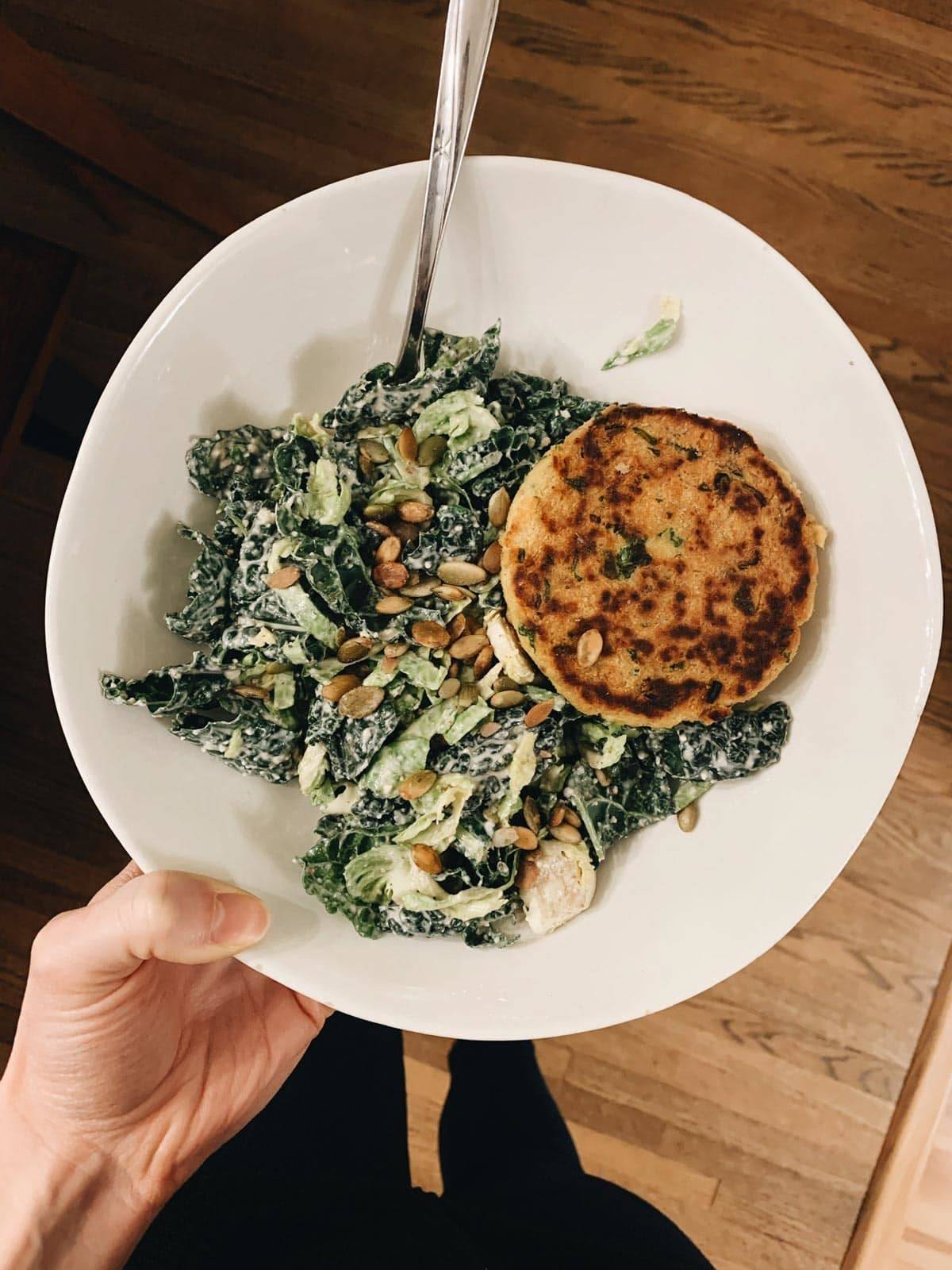 Salmon Burger buddied up with a Brussels Kale Caesar.