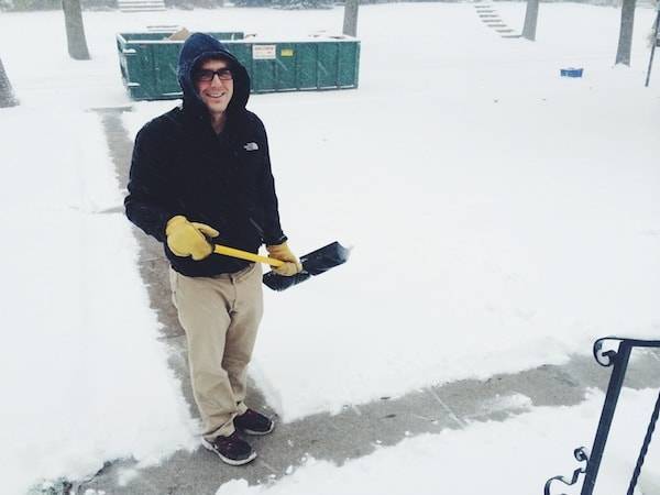 Man shoveling snow.