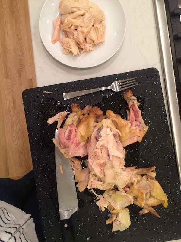 Chicken on a cutting board.