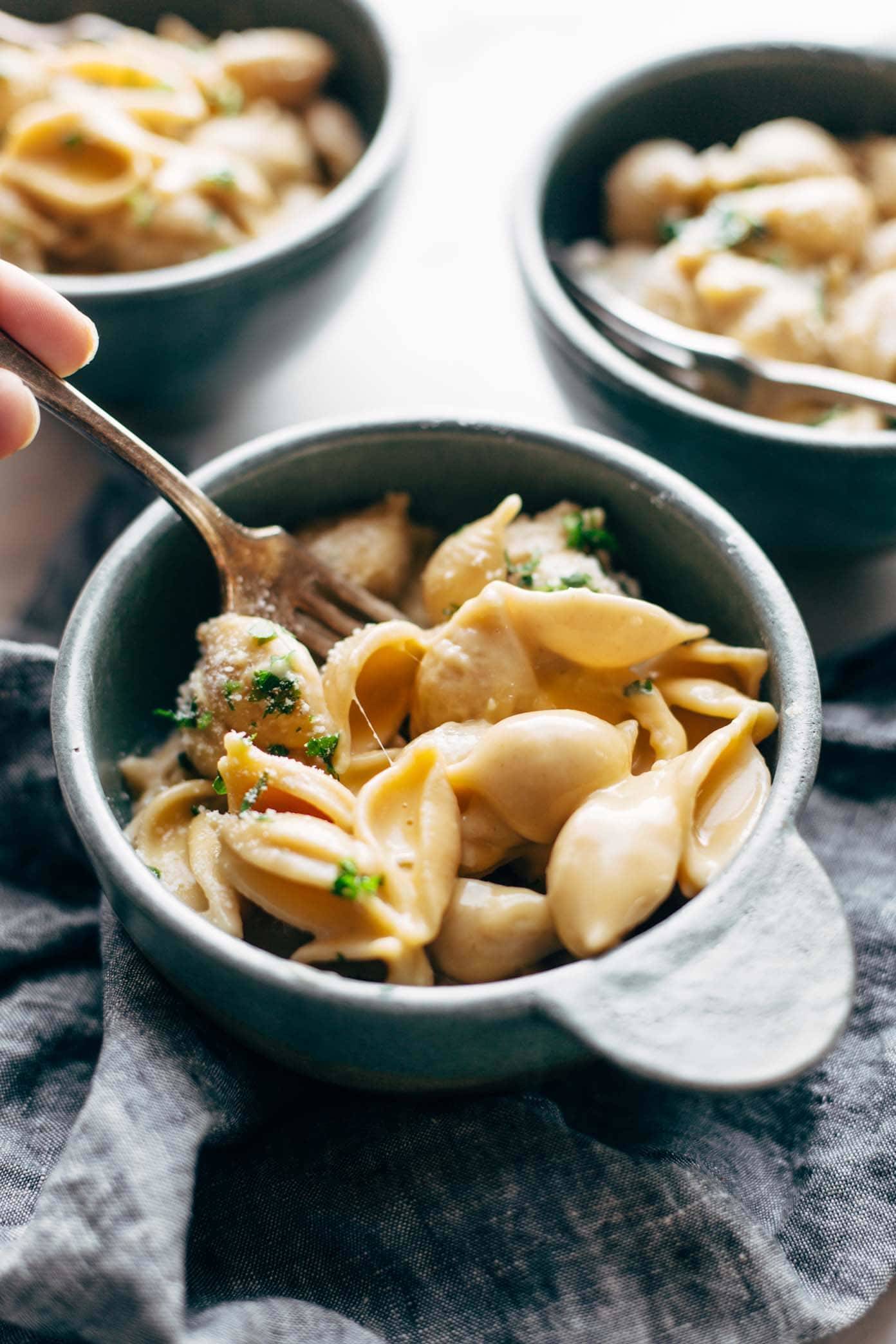 Instant Pot Mac and Cheese in a bowl with a fork.