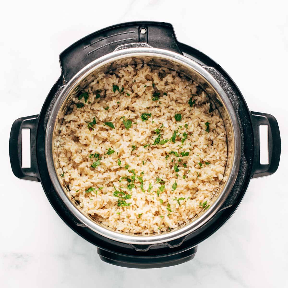 Brown rice in the Instant Pot with cilantro on top.