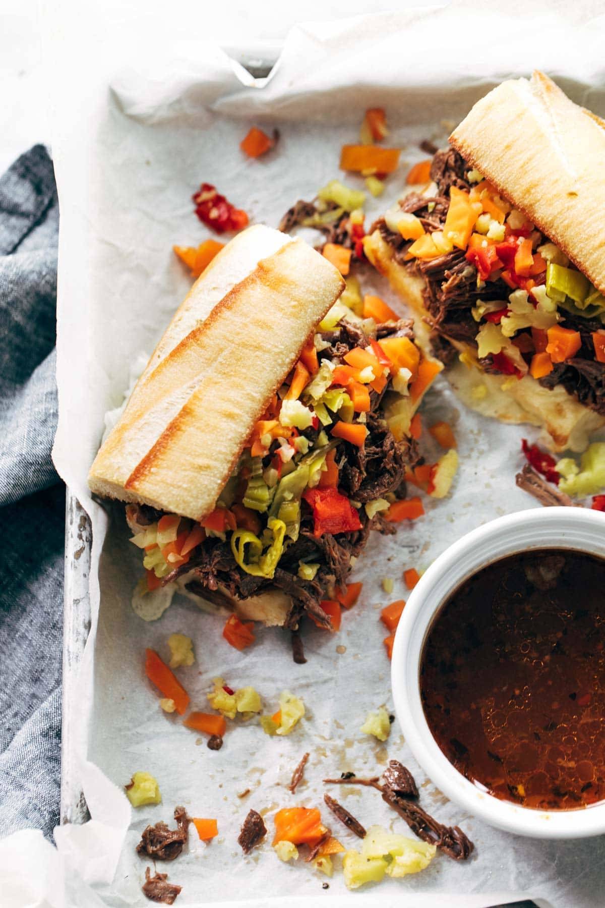 Instant Pot Italian Beef Sandwiches with dipping sauce.