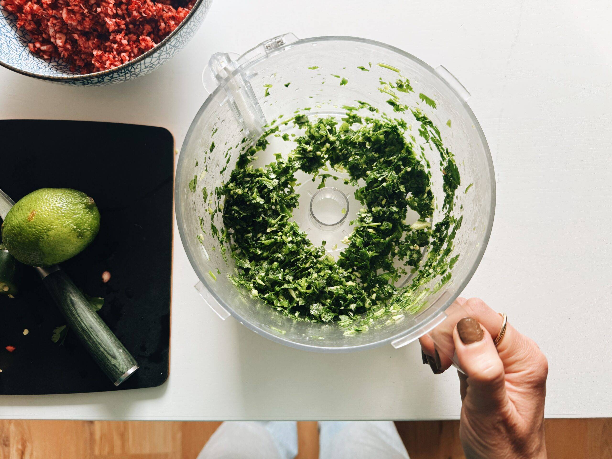 Chopped aromatics in a food processor.