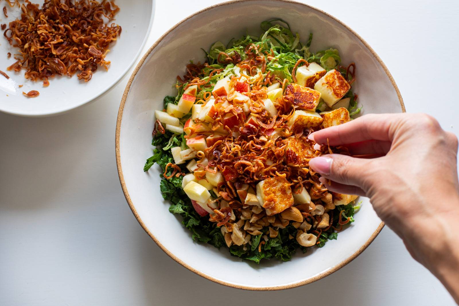 Topping salad with crispy shallots.