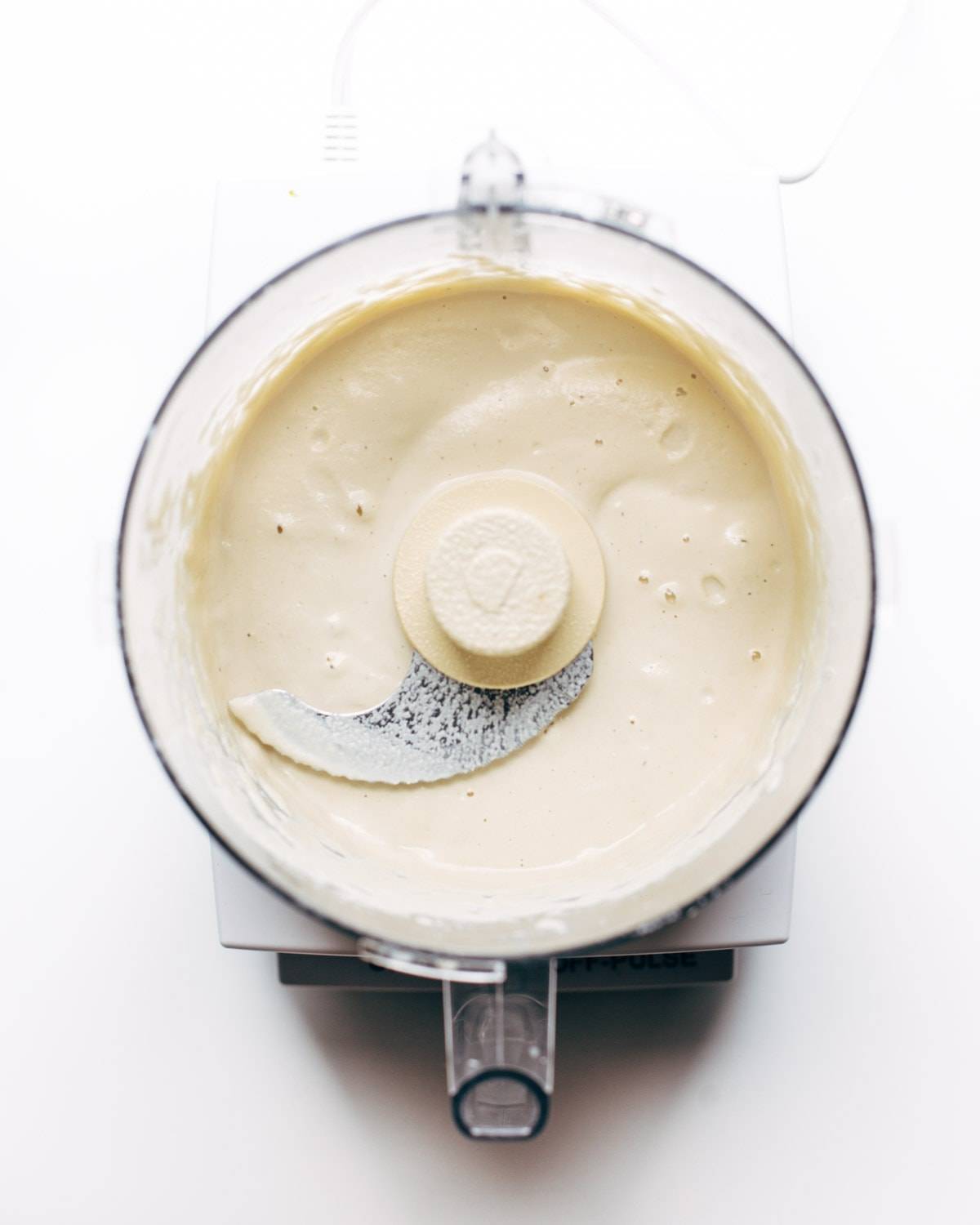 Creamy pasta sauce in a food processor.