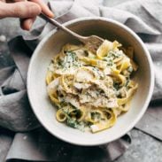 Creamy Kale Pasta in a bowl with a fork.
