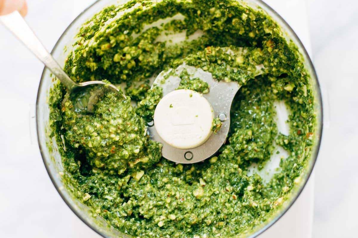 Kale pesto in a food processor.