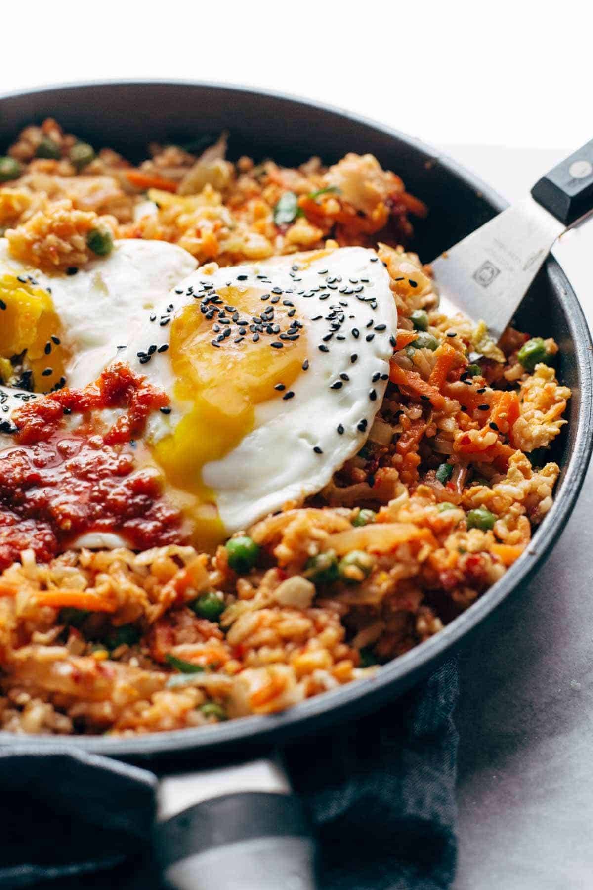 Kimchi fried rice in pan with egg.