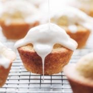 Lemon Lavender Muffins with glaze dripping down.