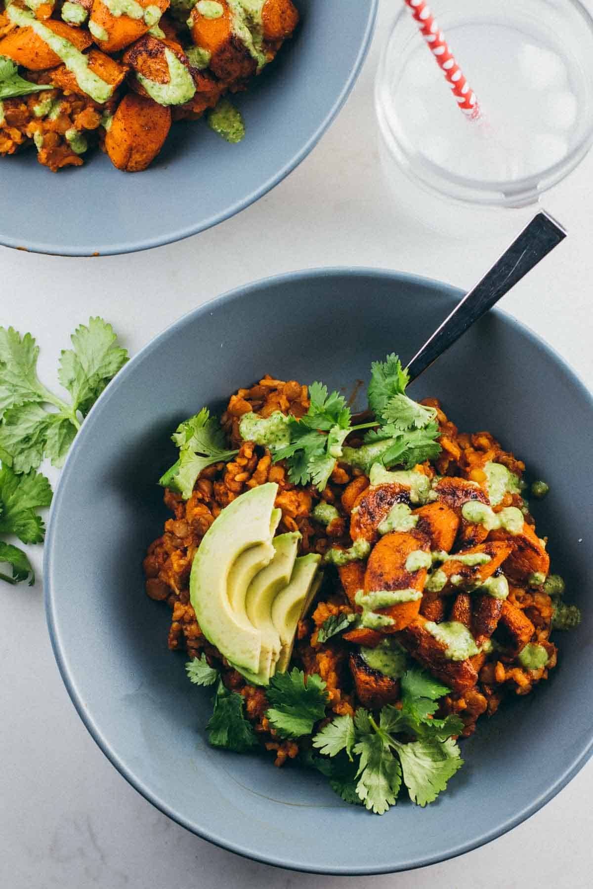 Lentil Curry Bowls with Cashew Cilantro Sauce in two bowls.