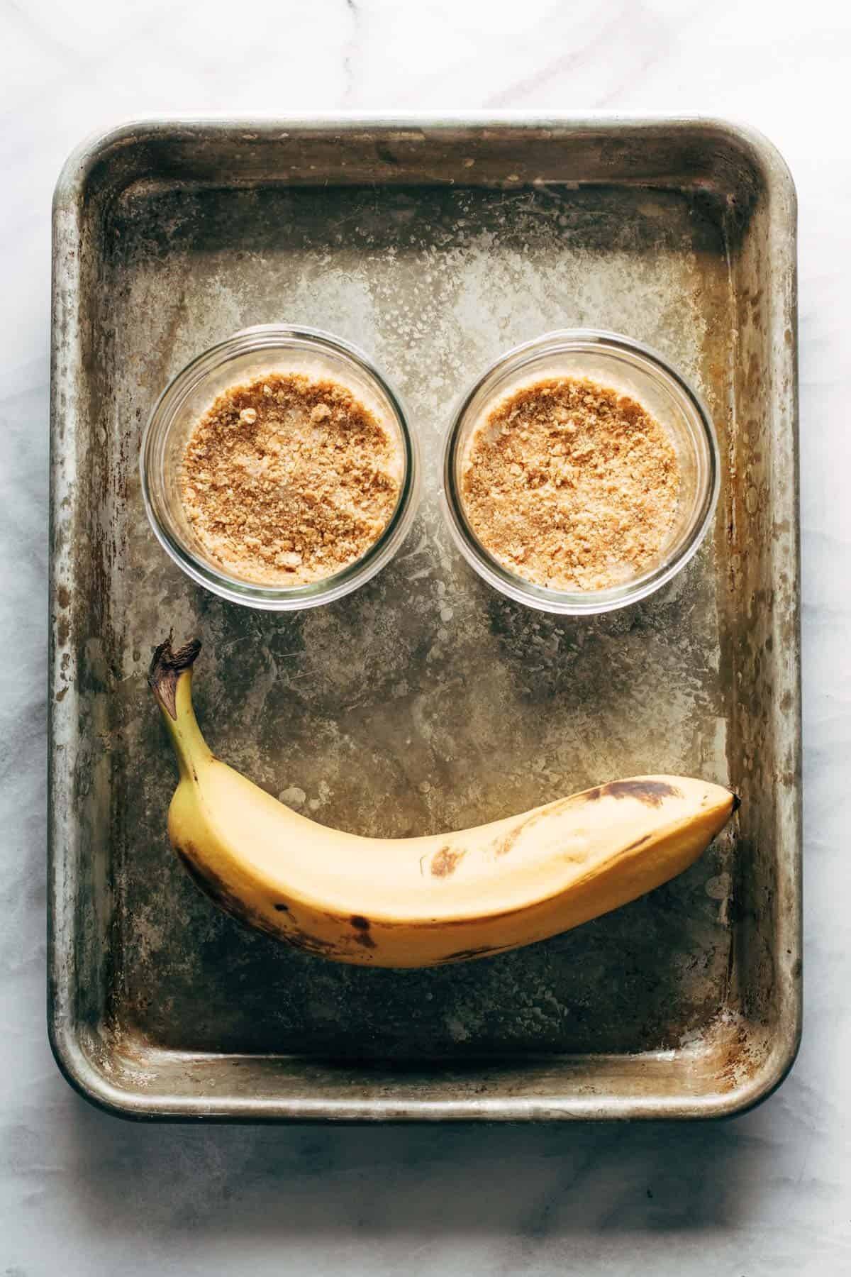 Ingredients for banana cream pie on a sheet pan.