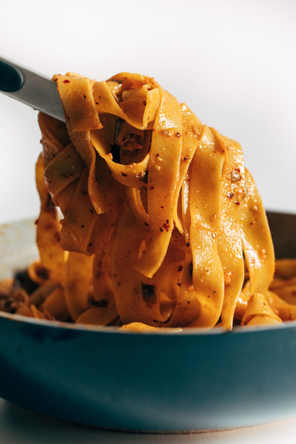 chili-garlic-pappardelle-with-smashed-broccoli-and-soft-eggs-recipe