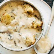Mushroom soup in a bowl with croutons.