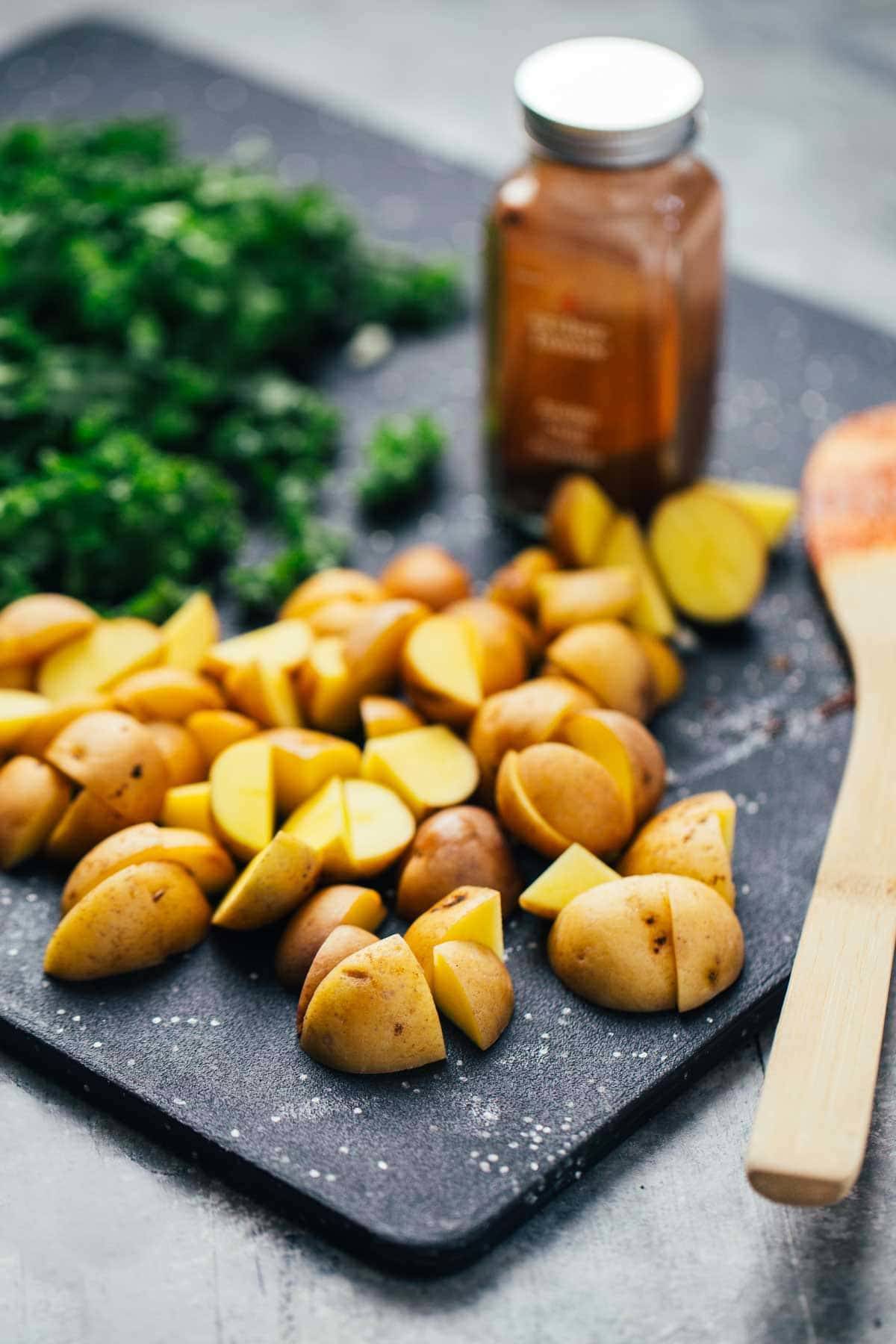 Potatoes on a cutting board.