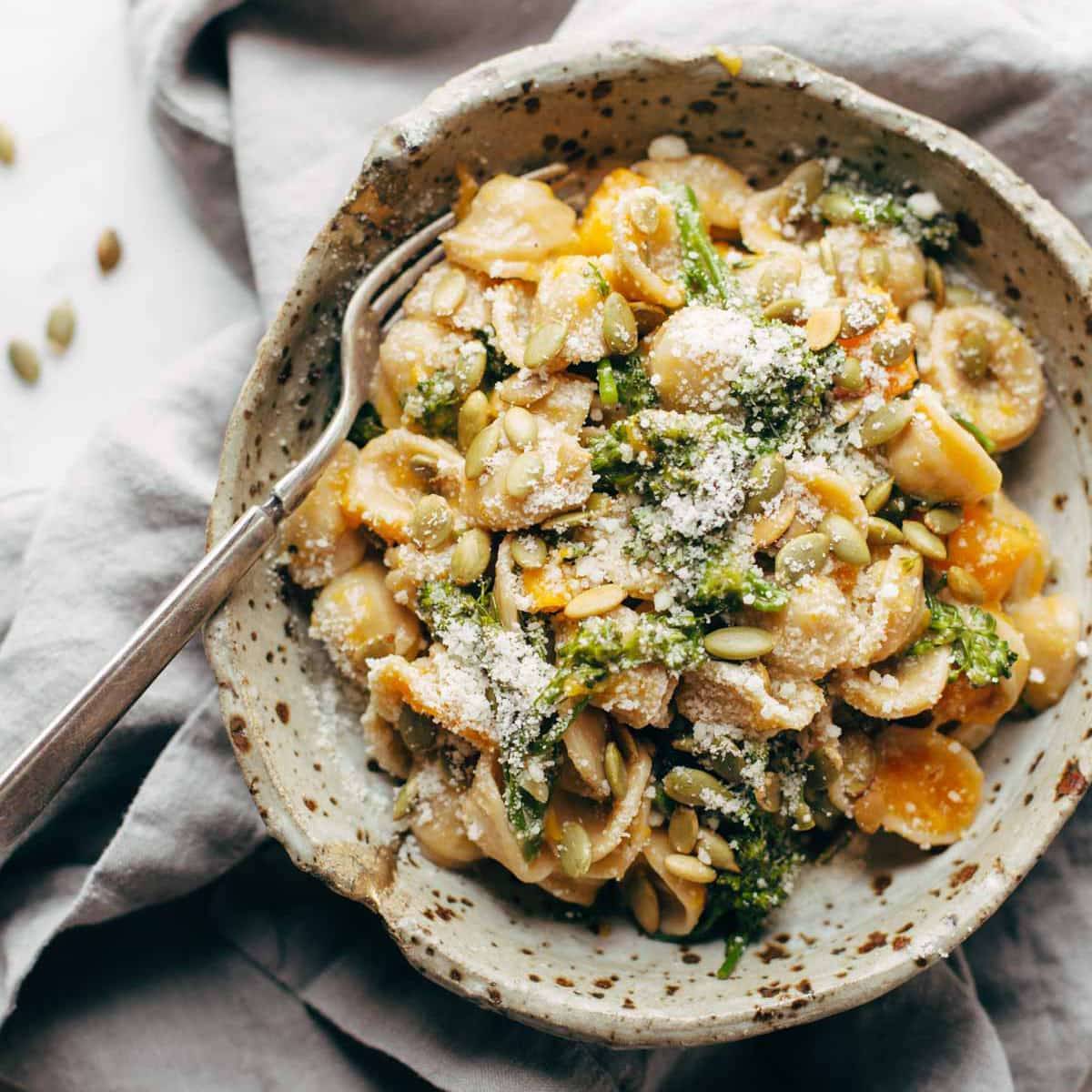 Creamy Parmesan Orecchiette in a bowl with fork.