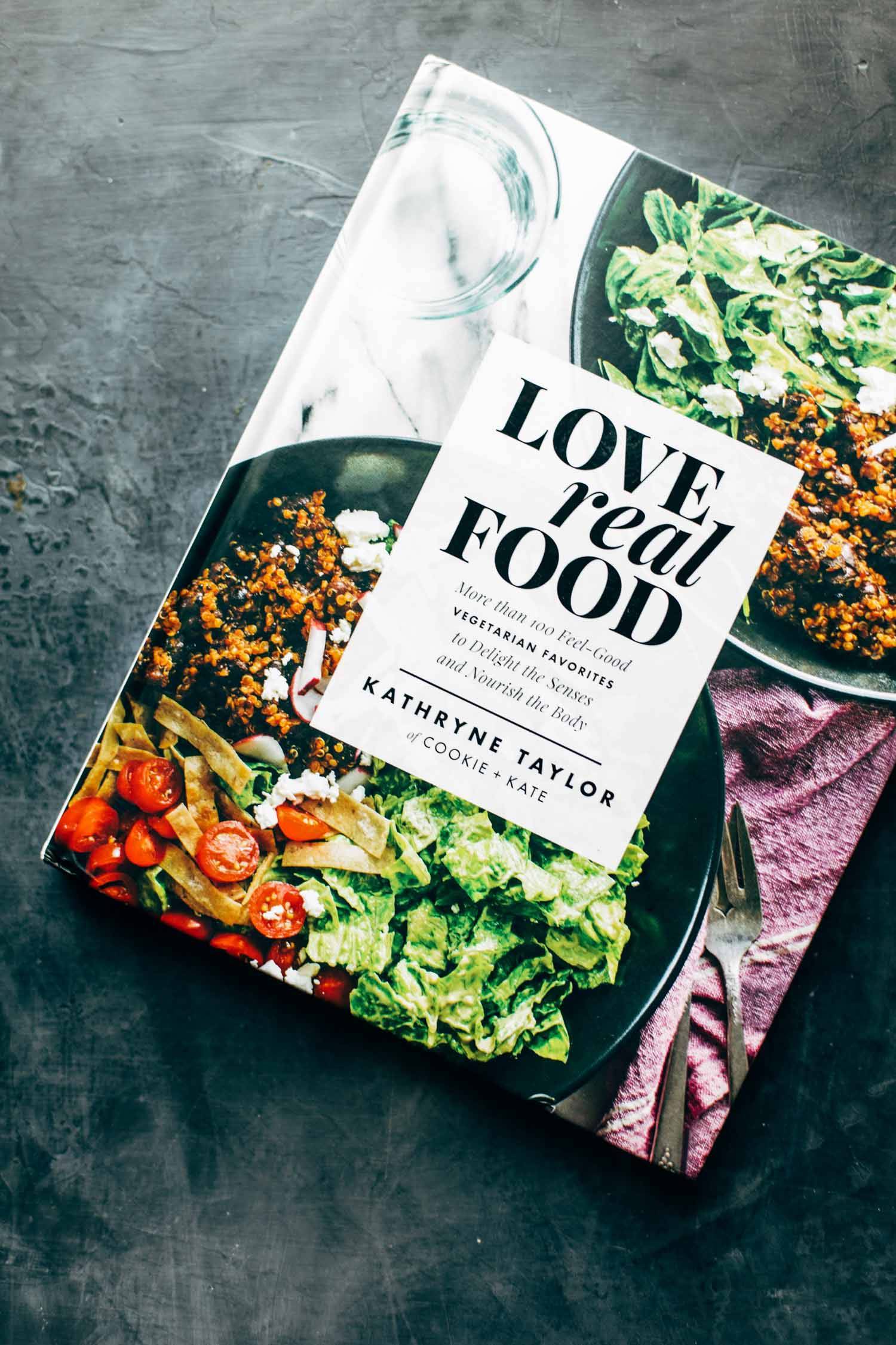 A photo of love real food book by Kathryne Taylor.