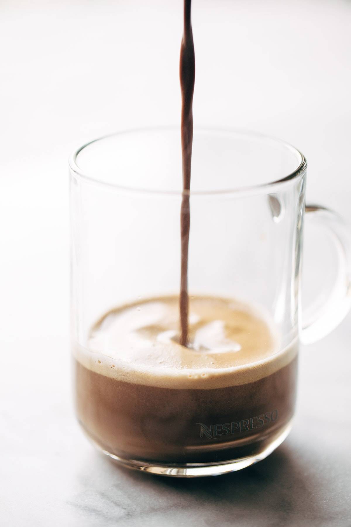 Cozy Homemade Peppermint Mocha! Creamy, minty, rich dark chocolate... SO yummy. Cozy up, grab a blanket and a book, and get your December on. | pinchofyum.com