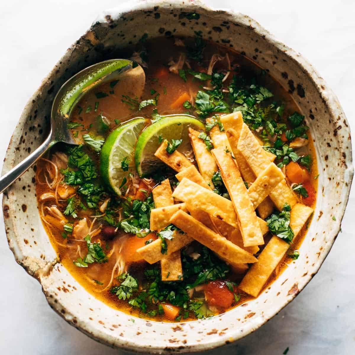 Chicken Tortilla Soup in a rustic bowl.