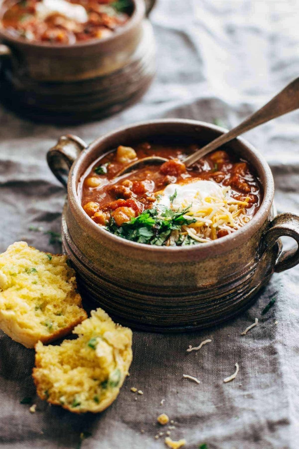 Spicy Posole with Cheesy Jalapeño Cornbread Muffins Recipe - Pinch of Yum
