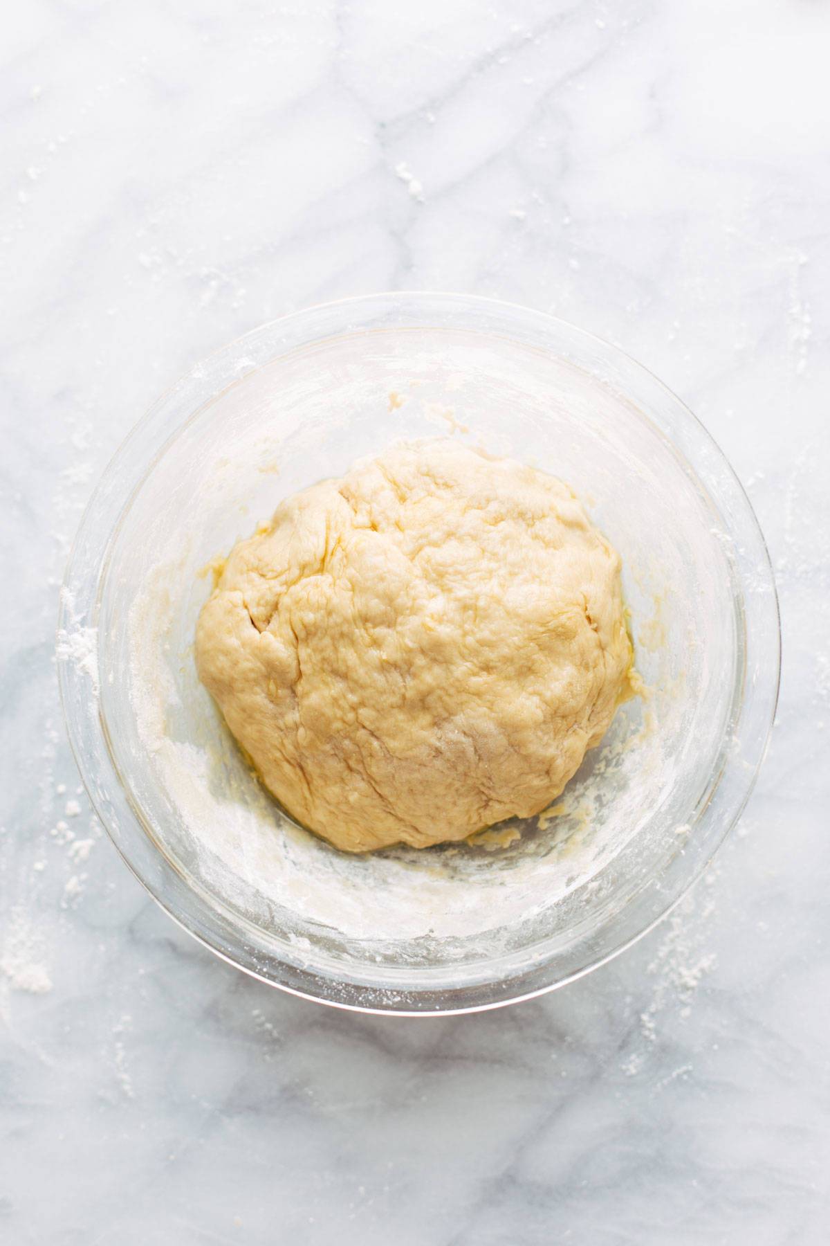 Dough for Basic Soft Pretzels uncovered in bowl.